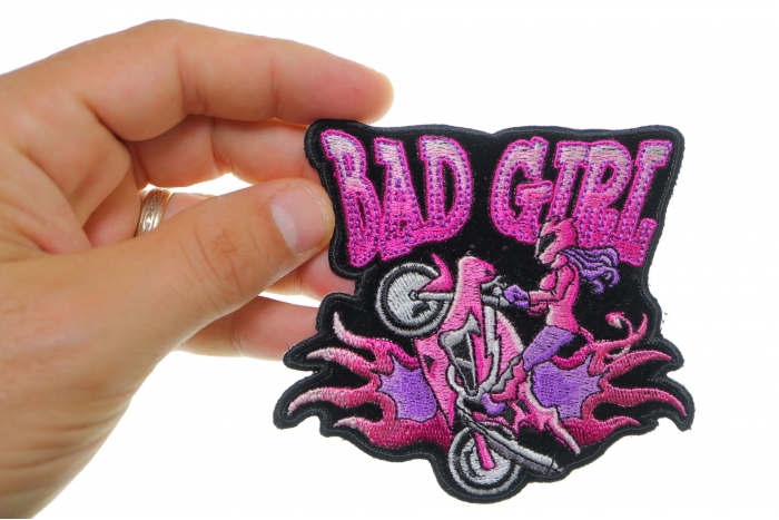 Bad Girl Motorcycle Patcg, Small Embroidered Iron on Patches shown on hand for size comparison