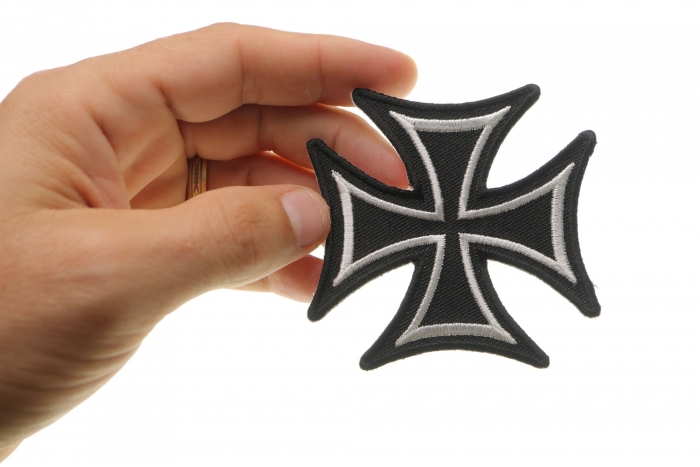 Biker Cross Patch shown on hand for size comparison