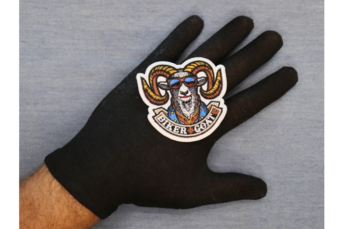 Biker Goat Patch shown on hand for size comparison