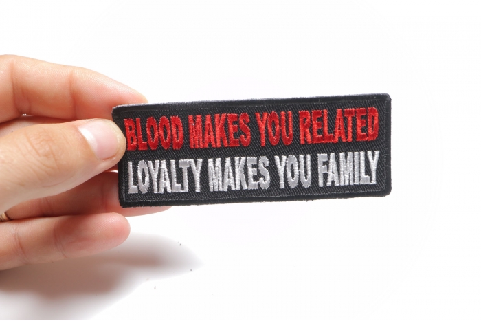 Blood Makes You Related, Loyalty Makes You Family Patch, Biker Saying Patches shown on hand for size comparison