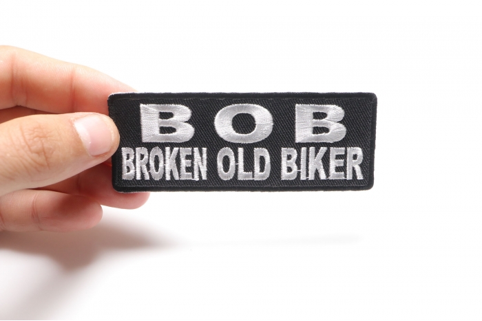 BOB Broken Old Biker Patch, Biker Saying Patches shown on hand for size comparison