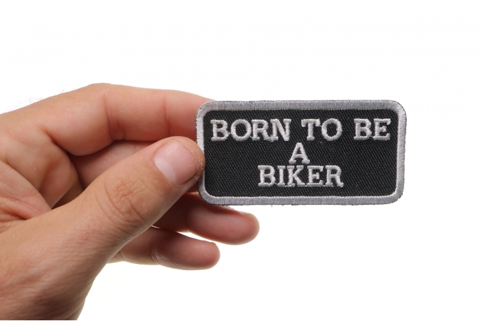Born To Be A Biker Patch, Biker Saying Patches shown on hand for size comparison