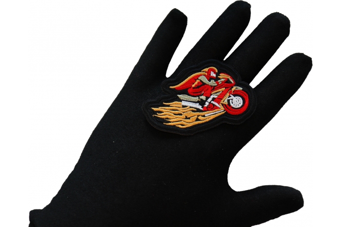 Red Cape Biker on Motorcycle Patch, Motorcycle Patches shown on hand for size comparison
