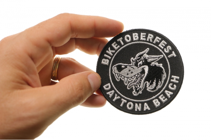 Daytona Biketoberfest Wolf Patch shown on hand for size comparison