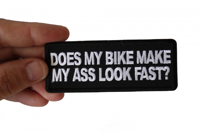 Does My Bike Make My Ass Look Fast Patch, Biker Saying Patches shown on hand for size comparison