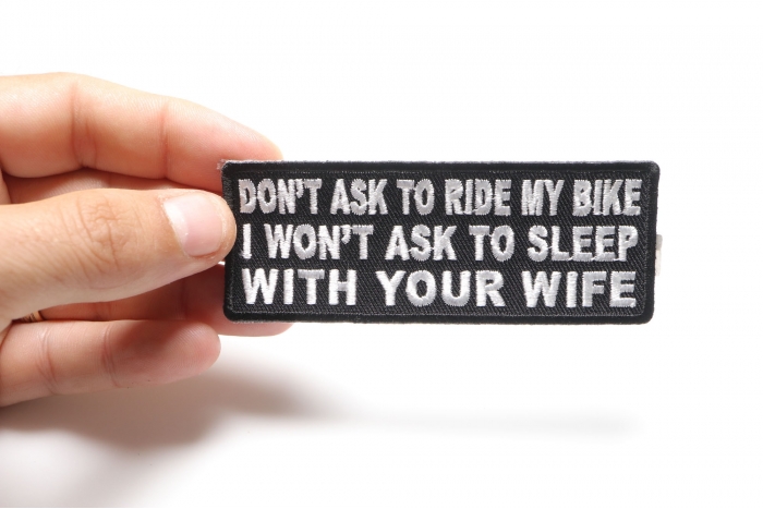 Don't Ask To Ride My Bike I Won't Ask To Sleep With Your Wife Patch, Biker Saying Patches shown on hand for size comparison
