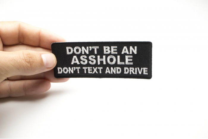 Don't Be An Asshole Don't Text and Drive Patch, Biker Saying Patches shown on hand for size comparison