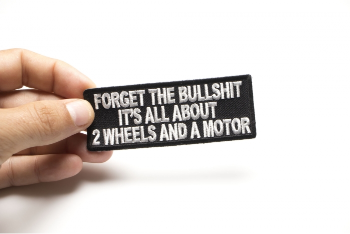Forget The Bullshit All About 2 Wheels and a Motor Patch, Biker Saying Patches shown on hand for size comparison