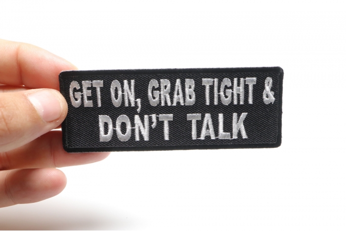 Get On Grab Tight and Don't Talk Patch, Biker Saying Patches shown on hand for size comparison