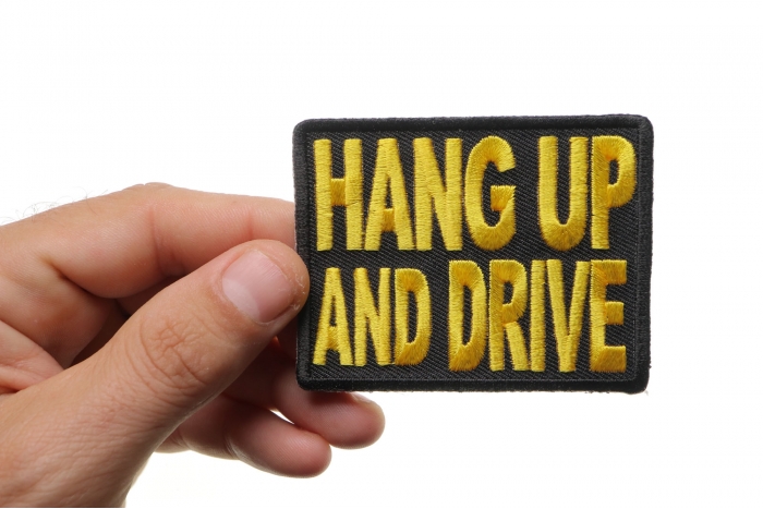 Hang Up and Drive Patch, Biker Saying Patches shown on hand for size comparison
