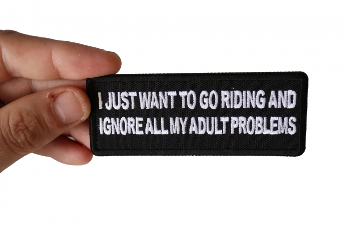 I Just Want to go Riding and Ignore all My Adult Problems Patch, Biker Saying Patches shown on hand for size comparison