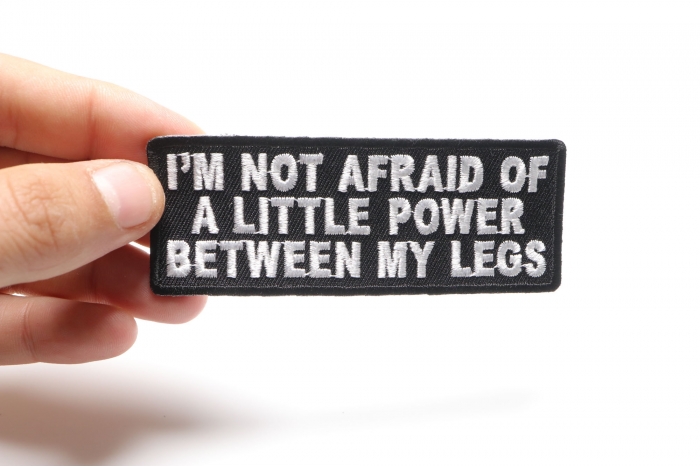 I'm not Afraid of a Little Power Between My Legs Patch, Biker Saying Patches shown on hand for size comparison