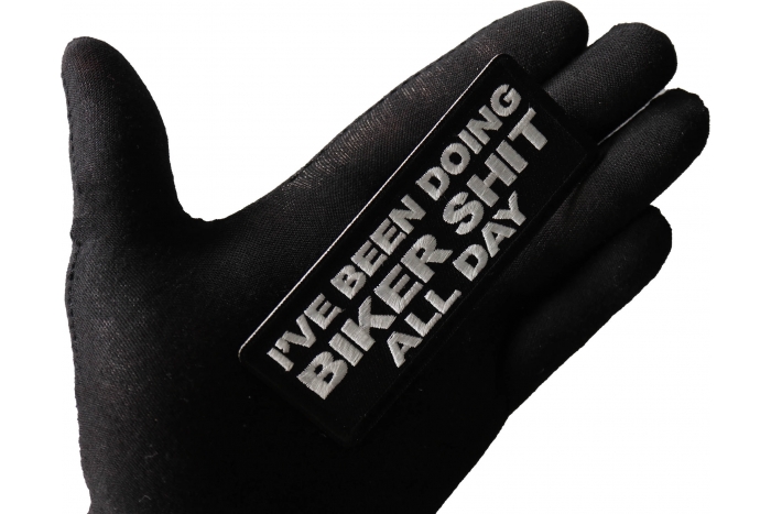 I've Been Doing Biker Shit All Day Patch, Biker Saying Patches shown on hand for size comparison