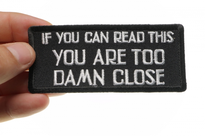 If You Can Read This You Are Too Damn Close Patch, Biker Saying Patches shown on hand for size comparison