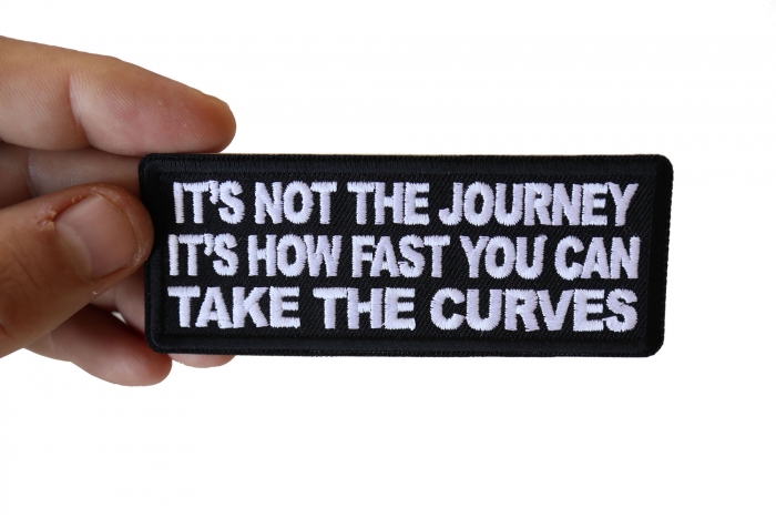 It's not the Journey It's How Fast you can take the Curves Patch, Biker Saying Patches shown on hand for size comparison