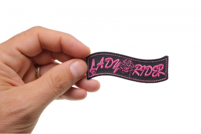 Lady Rider Patch, Biker Saying Patches shown on hand for size comparison