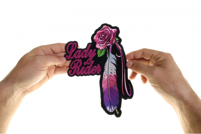 Lady Rider Rose and Feather Patch, Large Biker Back Patches for Leather Vests shown on hand for size comparison