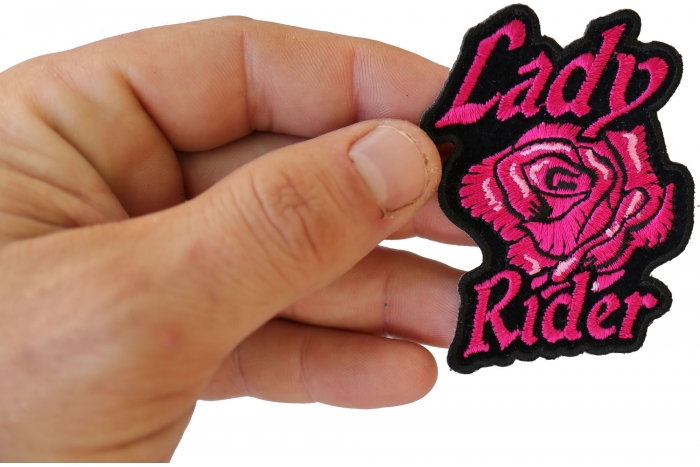 Lady Rider Pink Rose Iron on Biker Patch shown on hand for size comparison