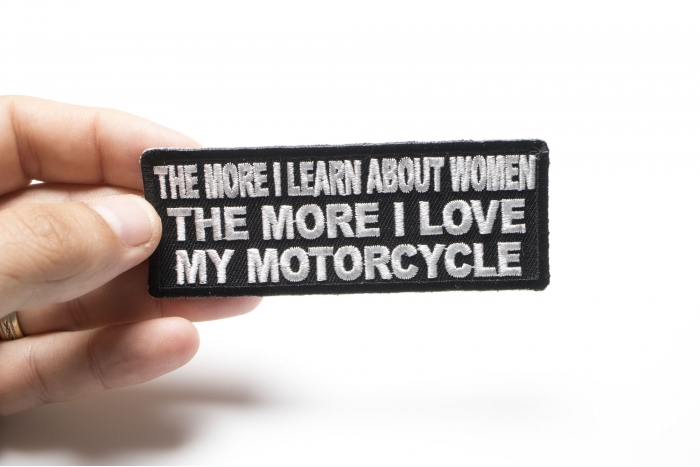 The more I Learn About Women The more I Love My Motorcycle Patch, Biker Saying Patches shown on hand for size comparison