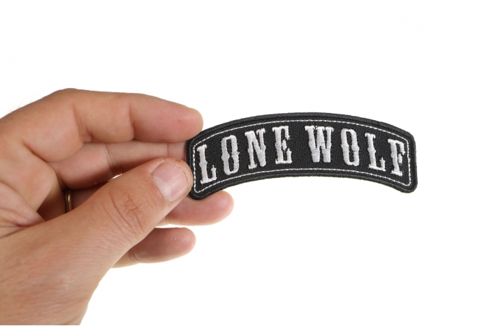 Lone Wolf Patch, Biker Saying Patches shown on hand for size comparison