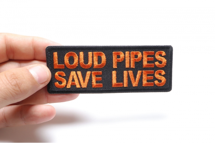 Loud Pipes Save Lives Patch, Biker Saying Patches shown on hand for size comparison