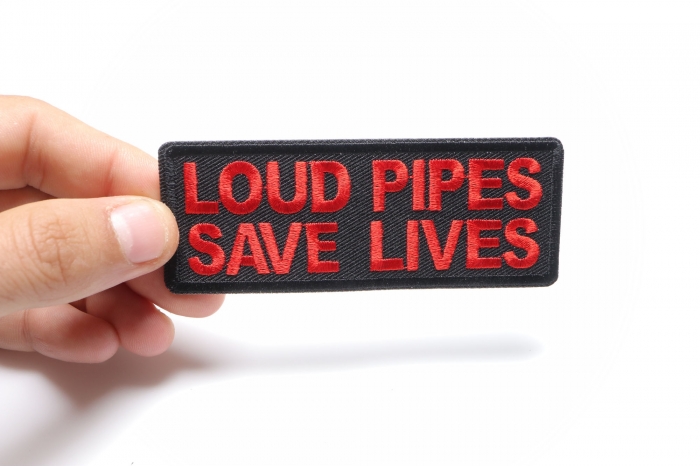 Loud Pipes Save Lives Patch, Biker Saying Patches shown on hand for size comparison