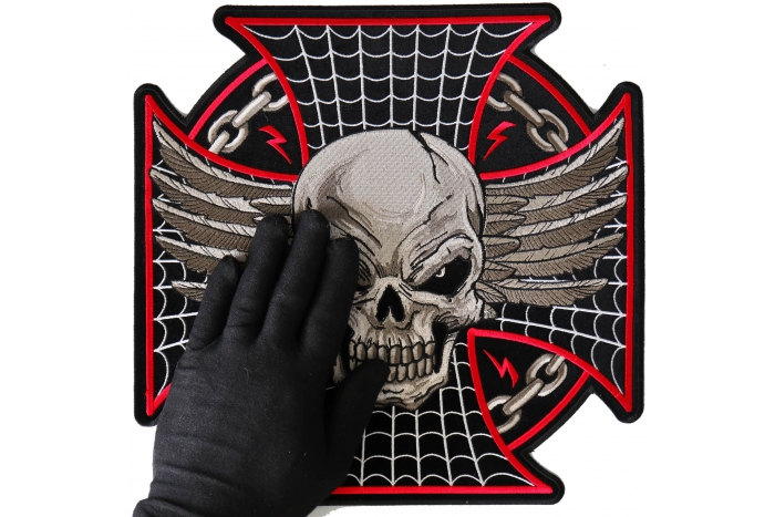 Maltese Skull Patch, Large Skull Patches for Biker Jackets shown on hand for size comparison