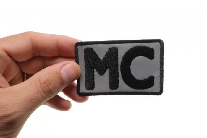 Reflective MC Patch, Biker Saying Patches shown on hand for size comparison