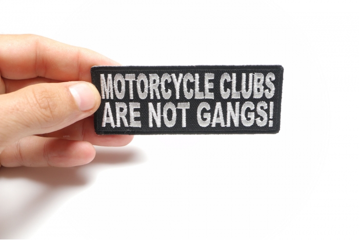 Motorcycle Clubs Are Not Gangs Patch, Biker Saying Patches shown on hand for size comparison
