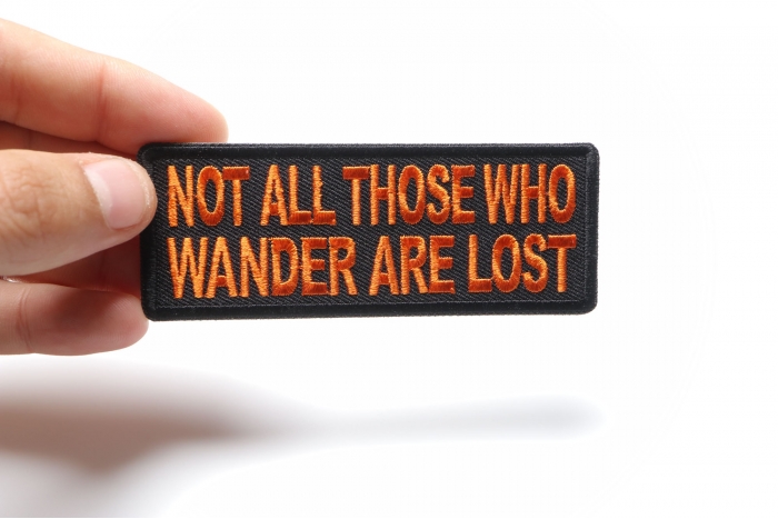 Not All Those Who Wander Are Lost Patch, Biker Saying Patches shown on hand for size comparison