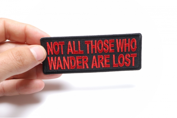 Not All Those Who Wander Are Lost Patch, Biker Saying Patches shown on hand for size comparison