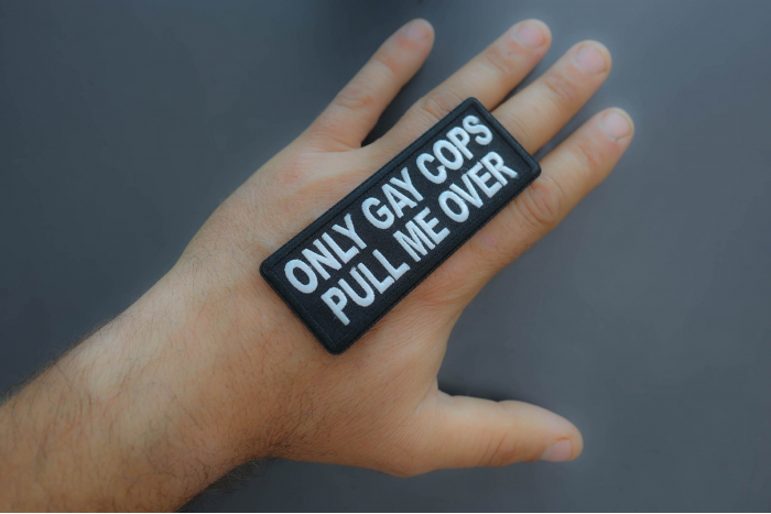 Only Gay Cops Pull me Over Patch shown on hand for size comparison