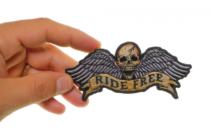 Ride Free Skull and Wings Patch, Biker Skull Patches shown on hand for size comparison