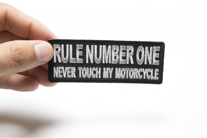Rule Number One Never Touch my Motorcycle Patch, Biker Saying Patches shown on hand for size comparison