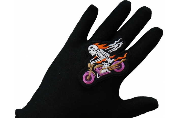 Skelo Motorcycle Rider Patch, Biker Skull Patches shown on hand for size comparison