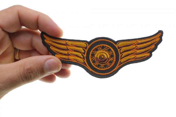 Orange Wings Motorcycle Patch, Motorcycle Patches shown on hand for size comparison