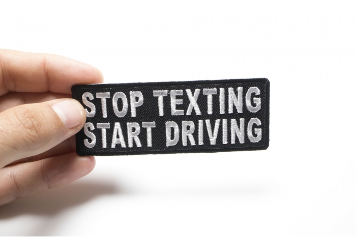 Stop Texting Start Driving Patch, Biker Saying Patches shown on hand for size comparison