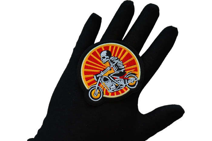 Sunset Skeleton Biker on Motorcycle Patch, Biker Skull Patches shown on hand for size comparison