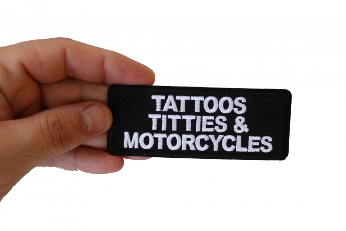 Tattoos Titties and Motorcycles Patch, Biker Saying Patches shown on hand for size comparison