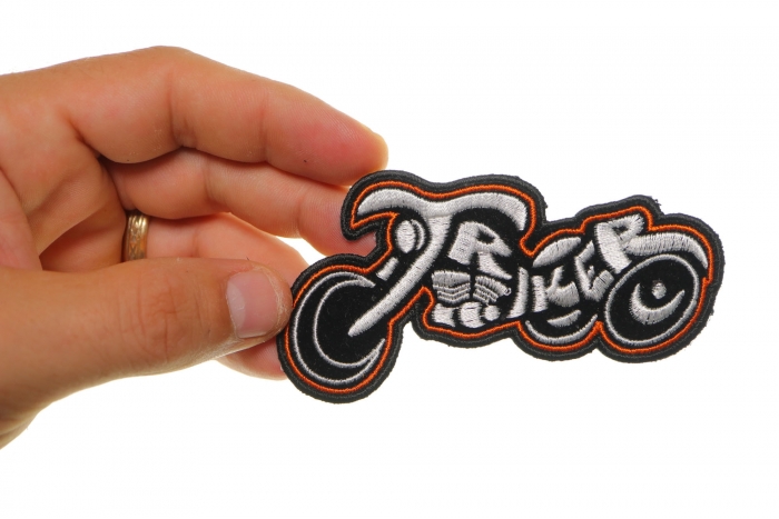 Triker Small Biker Patch In White and Orange shown on hand for size comparison