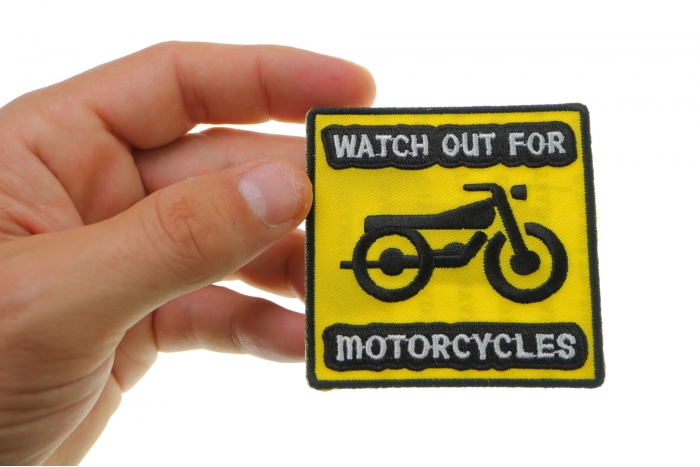  shown on hand for size comparison