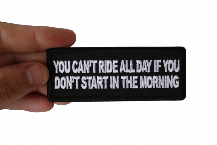 You Can't Ride All Day if You Don't Start in the Morning Patch, Biker Saying Patches shown on hand for size comparison