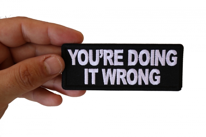 You're Doing it Wrong Patch, Biker Saying Patches shown on hand for size comparison