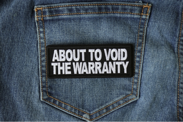 About to Void the Warranty Patch shown on jeans