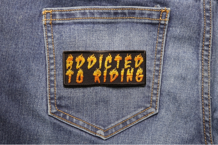 Addicted To Riding Fun Motorcycle Biker Patch shown on jeans
