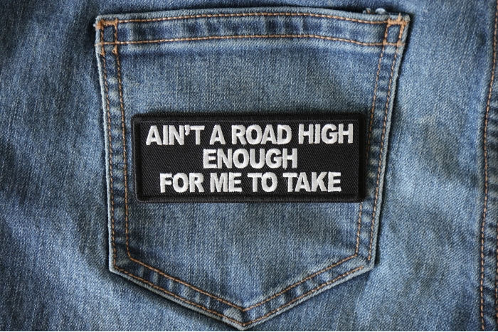Ain't A Road High Enough for me to take Patch shown on jeans