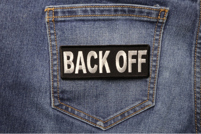Back Off Patch shown on jeans