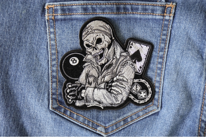 Biker Life Skull 8 Ball Aces and Dice Patch shown on jeans