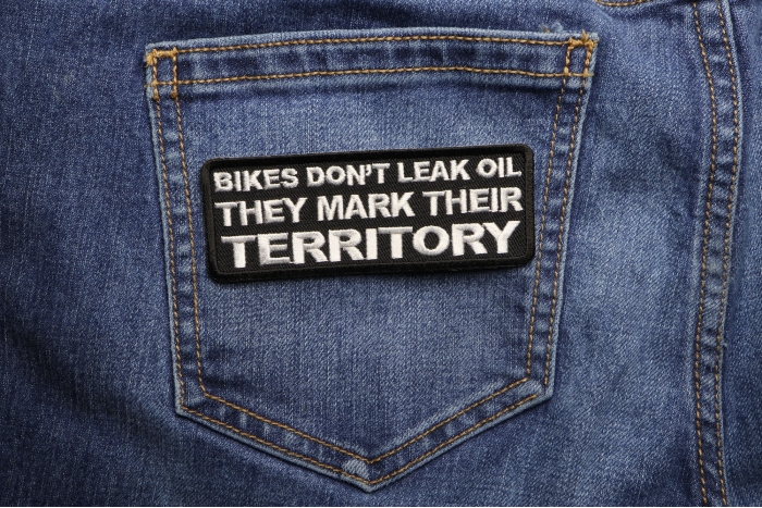 Bikes Don't Leak Oil They Mark Their Territory Patch shown on jeans