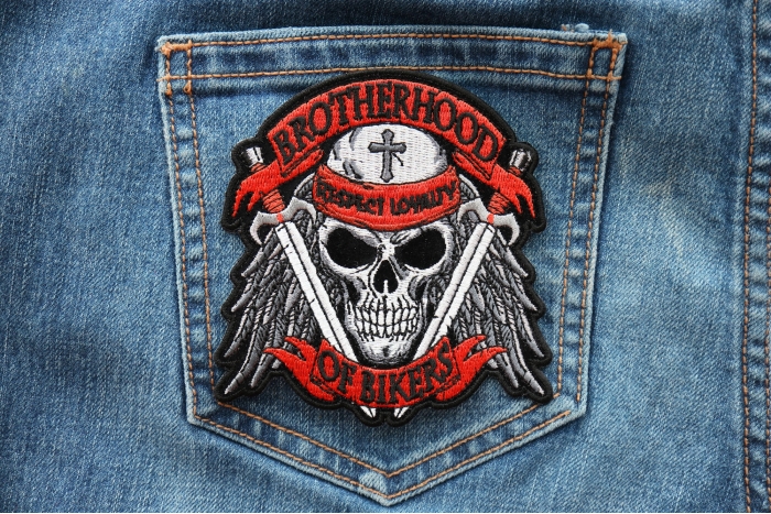 Brotherhood of Bikers Respect and Loyalty Skull and Swords Patch shown on jeans